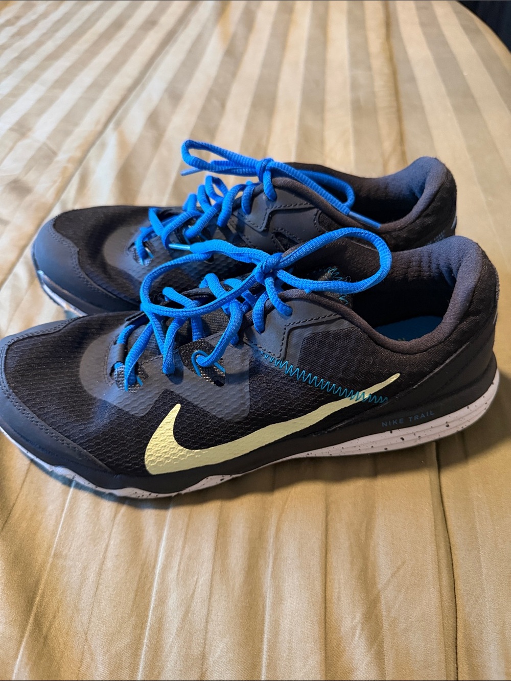 Nike Black Sneakers with Blue Laces and Yellow Swoosh